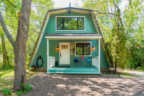 Rustic Riverside A-Frame Retreat: Secluded Charm.