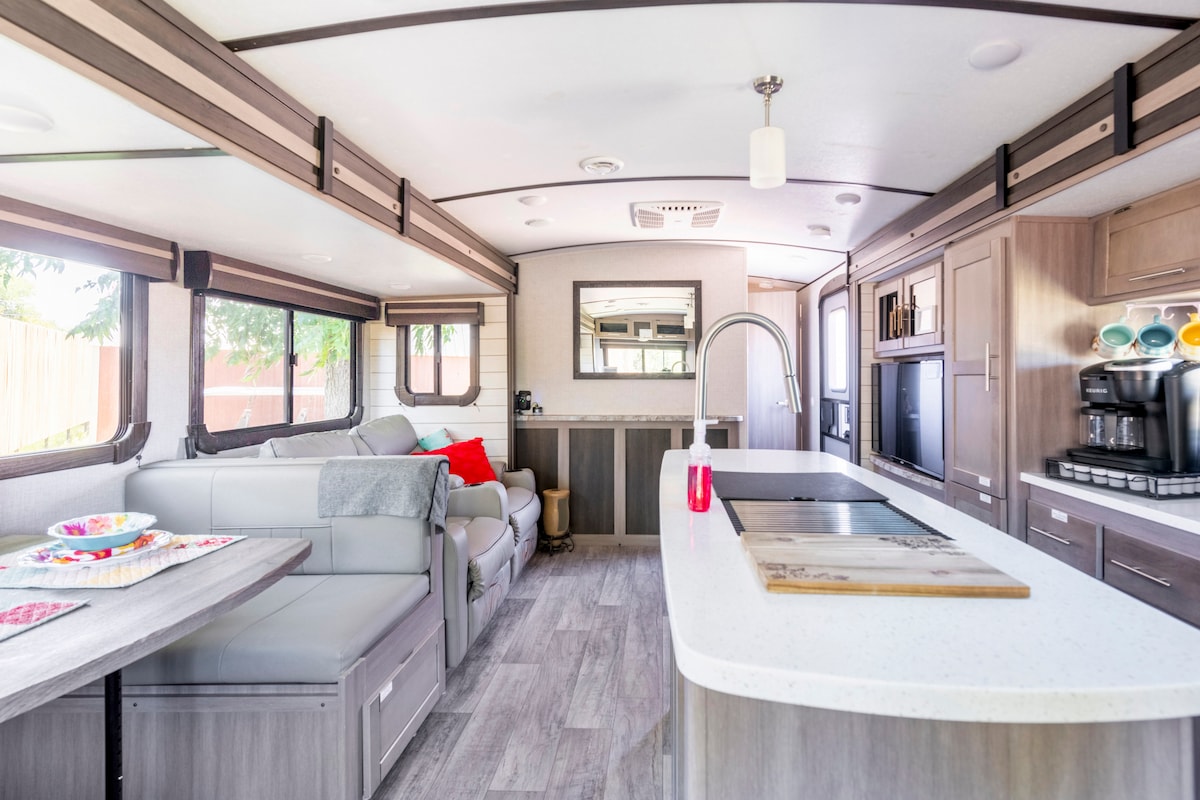 Lazy Lounges & Lively Lattes: Lounge Leisurely, Sip in Serenity, and Soak in the Scenic Views. Ready for a River Adventure Right Outside Your Door!