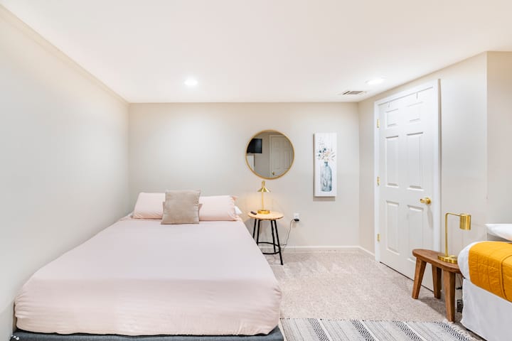 Bedroom #5 with 1 Queen bed and 1 Twin bed. Also, bedrooms closet space with full size door mirror. Plus a work desk with comfortable chair. Enjoy your favorite shows on a 32in Smart TV. Very homey!