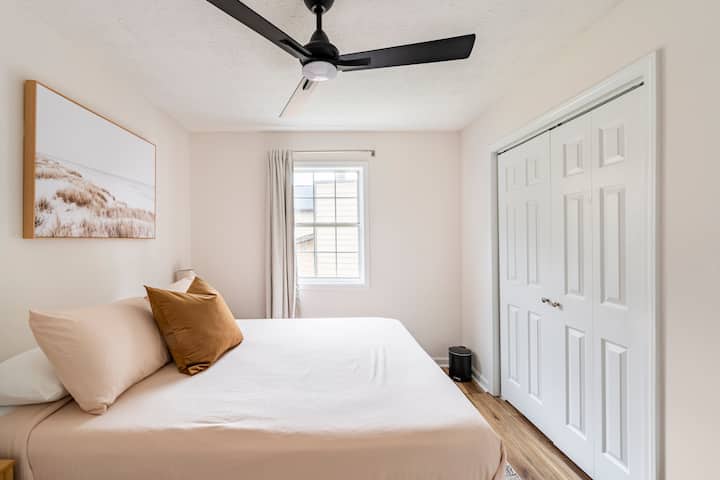 Explore Bedroom #3, your cozy retreat featuring a queen bed with a luxurious memory gel mattress and an assortment of comfortable pillows to suit your sleep preferences. Additionally, a dedicated seating area with a convenient mirror.