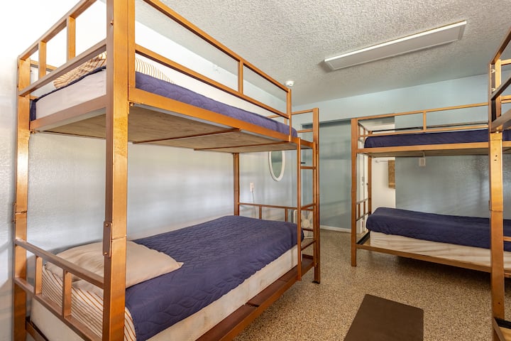 This spacious bunk room offers plenty of sleeping space for groups and families. Sturdy bunks and open space make it great for kids and large gatherings.