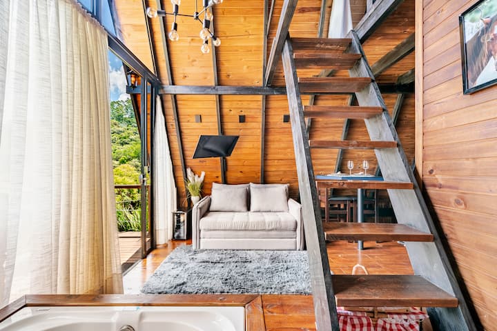 Chalet with bathtub and pool