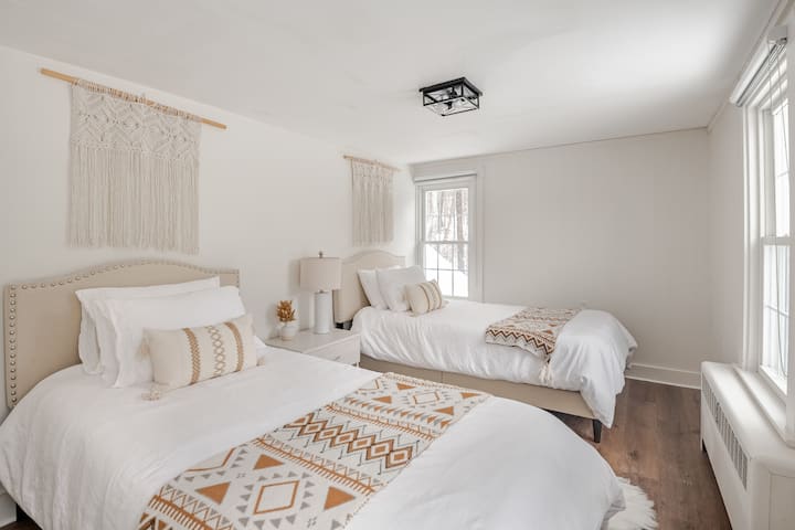 4 Nectar + Purple twin mattresses, blackout blinds, window AC, games, children's books, and a queen pull out sofa