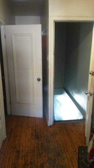 private exit is next to the room door. come and go at any time. bathroom & kitchen is also directly in front of these doors. smoking outside only