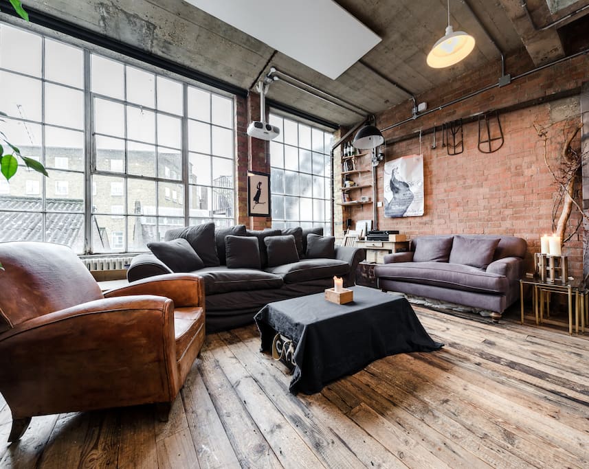 Beautiful large windows flood the loft space with light