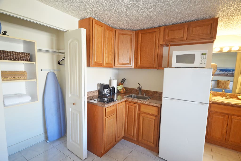 Iron w/ ironing board and towels are provided.