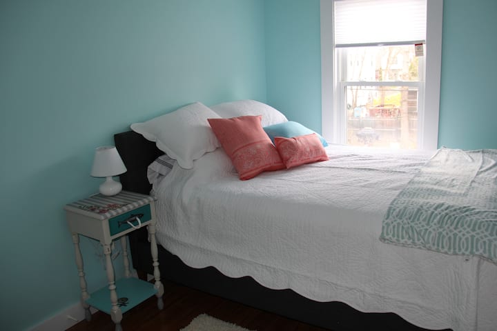 Upstairs, front bedroom.