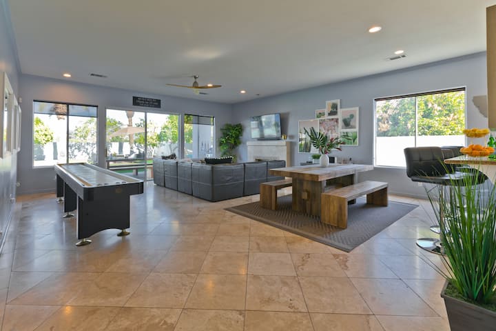 Family room with Sonos music (shuffleboard table no longer there).