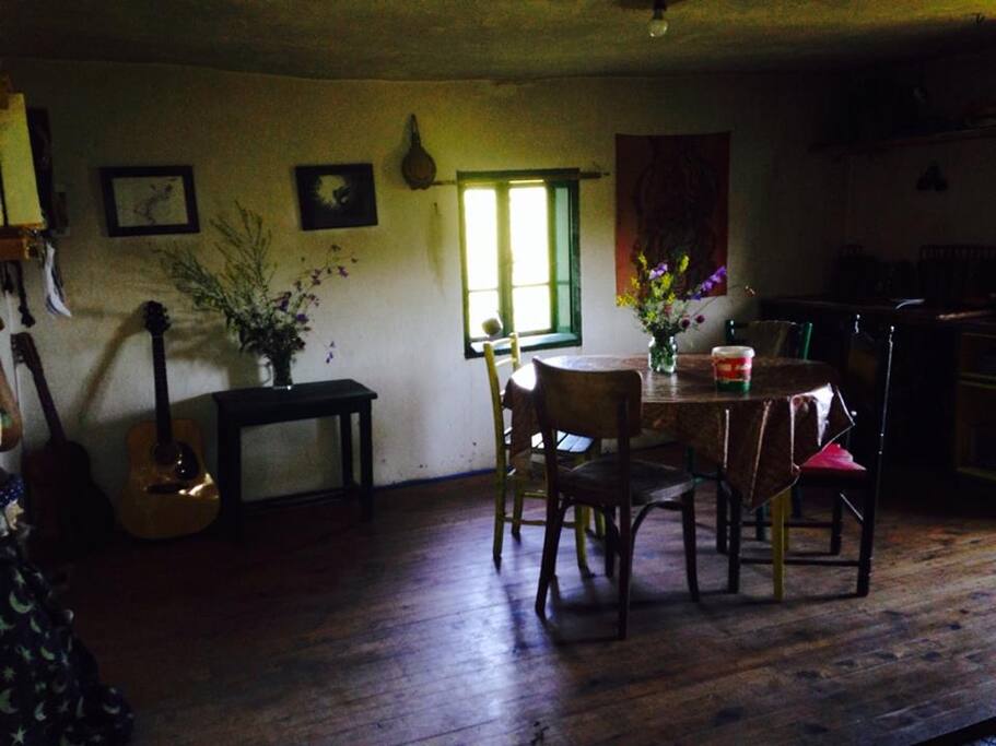 Our tranquil kitchen diningroom, one of the most loved rooms. Great accoustics! This room was traditionally used for singing by many local famalies and glad to say it still is.