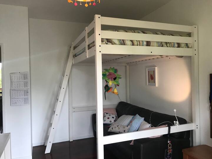 Loft bedroom. Queen size bed. Ranch slider access to covered wrap around deck.