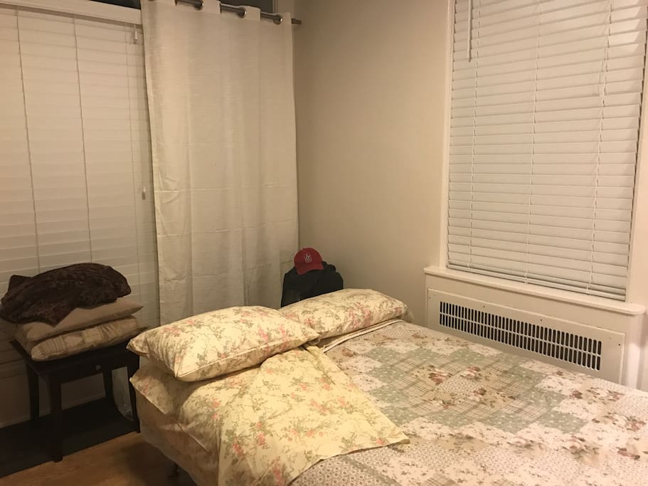 Euro sofa in bedtime mode Room is completely private walled off with curtains and private entrance through back door.