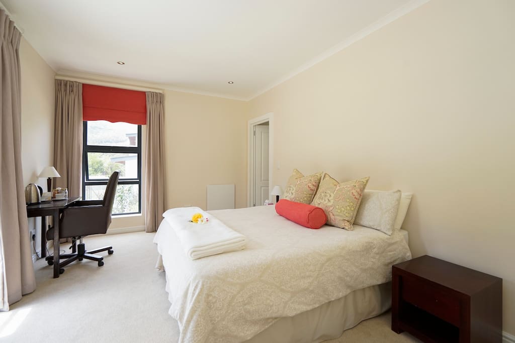 Guest suite on ground floor with ensuite bathroom, desk with wifi, tea and coffee station