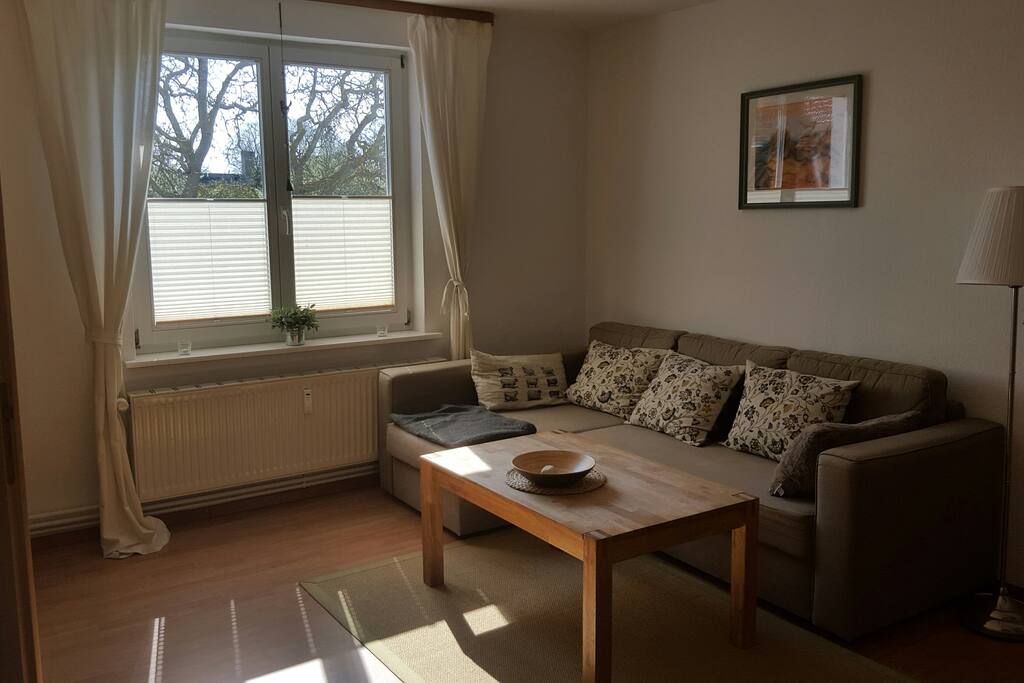 Wohnzimmer mit Schlafsofa