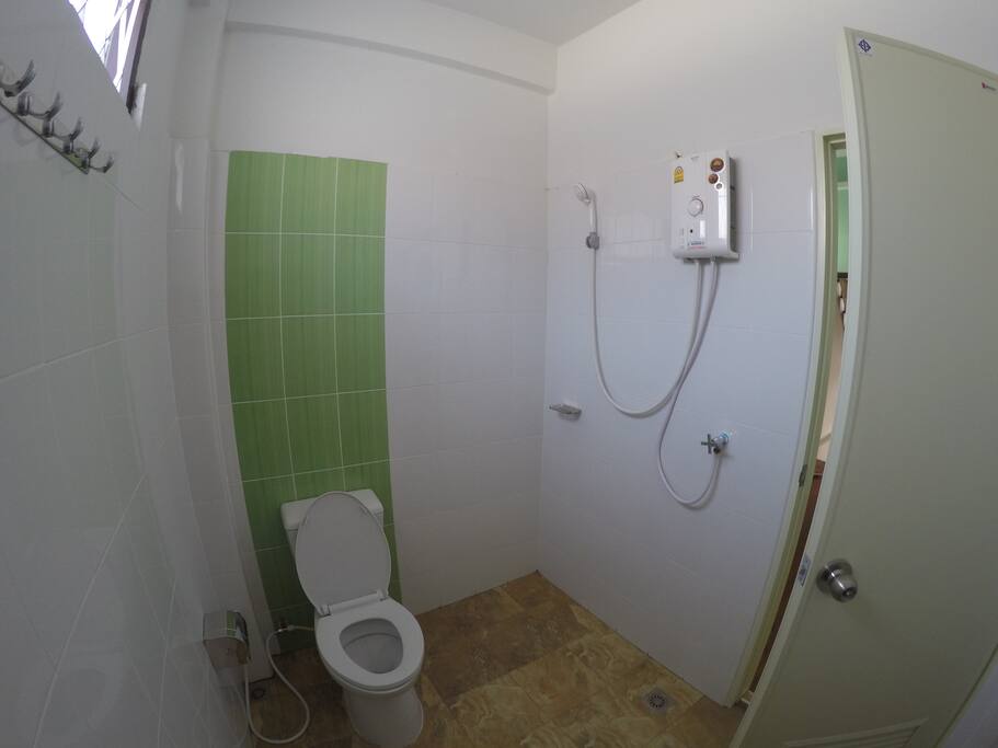 Private toilet with water heater & amenities