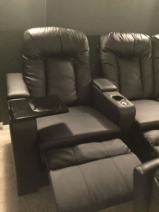 All seats fully recline and have cup holders - back row also has table attachments