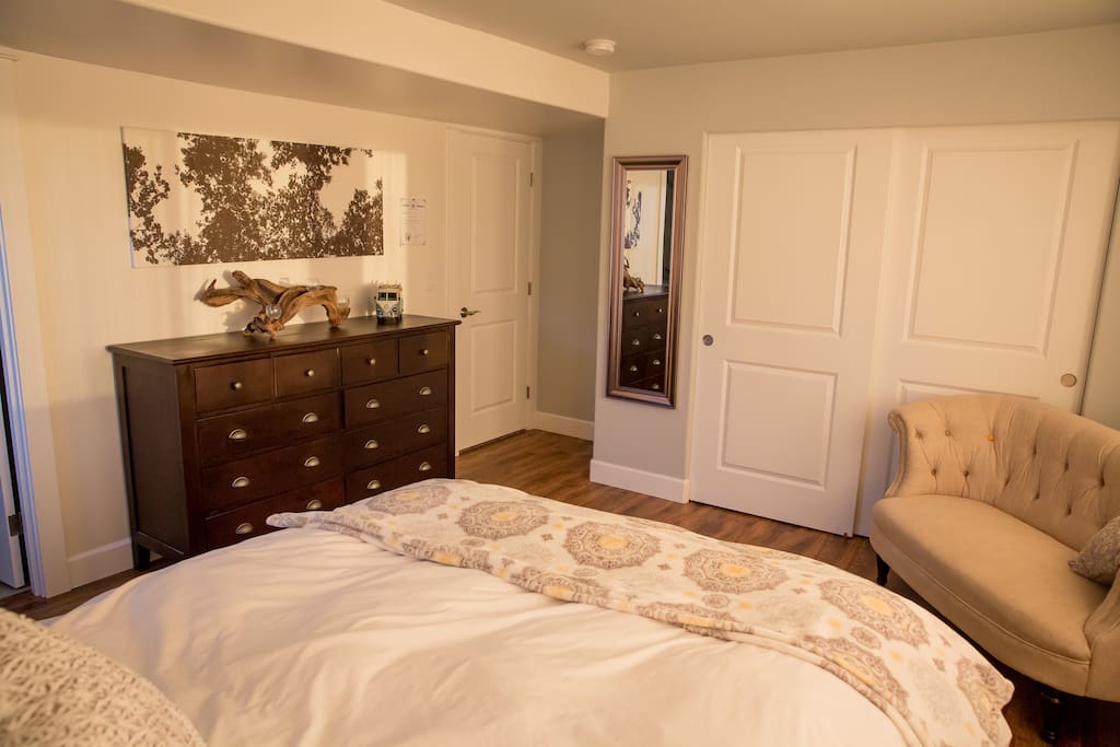The left half of the dresser is cleared for our guests along with half of the large closet.