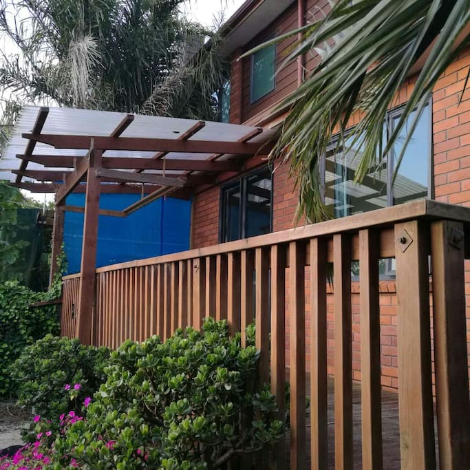 Showing the separate own entrance and the own deck.