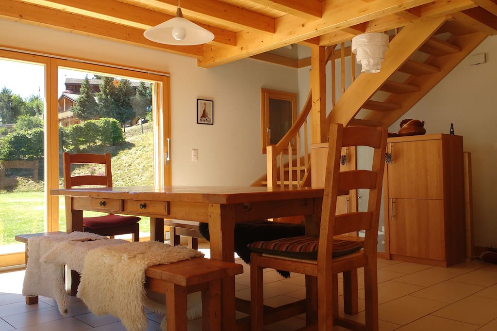 Large kitchen table, very bright and airy room.