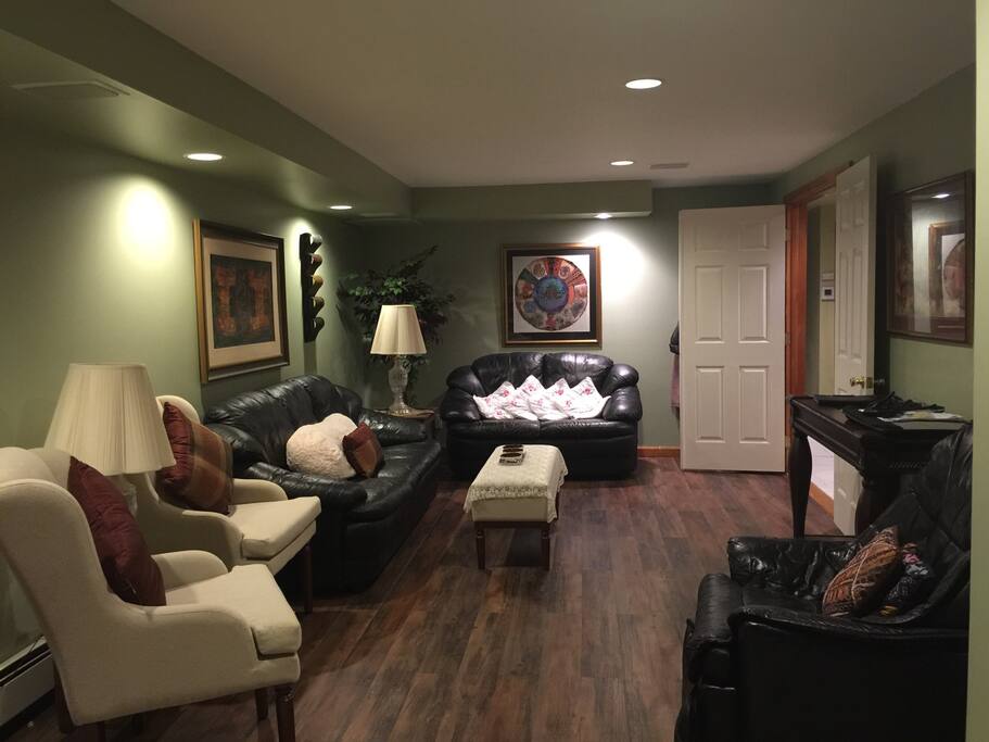 Nicely appointed lounge with Leather Sofas.