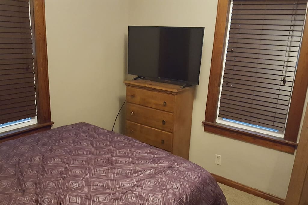new large flat screen tv and dresser.