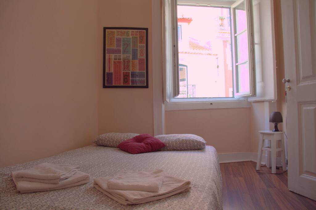 one of the bed of the room