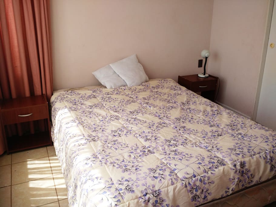Dormitorio principal con vista oriente