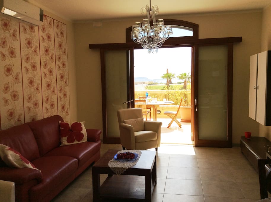 Living area to terrace, pool and views.