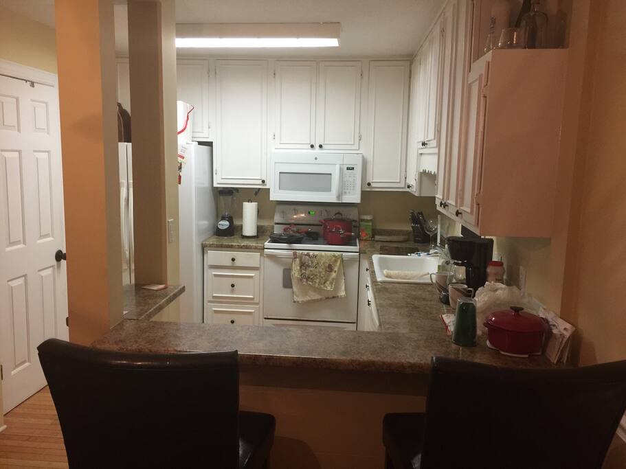 Fully functional kitchen for cooking meals for your whole group. Includes: coffee pot, mugs, silverware, plates, pantry closet, cups, pots/pans, and cooking utensils.
