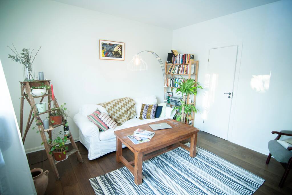 There is a cosy sofa, hope you'll like it. It can be used as a bed.