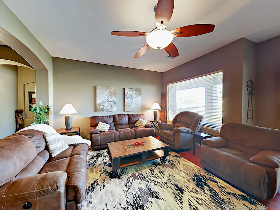 Living room with vaulted ceilings and plush seating for 7.