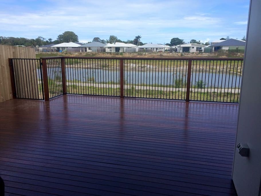 Beautiful outdoor deck overlooks Lake Piccolo.