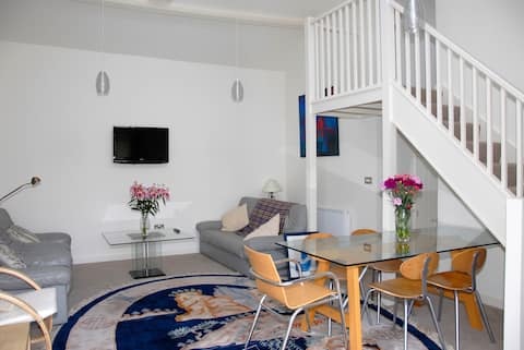 Detached with private garden leading to sea views