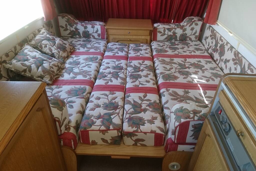 King size bed with sheets, pillows and duvet cover in the cupboard which I will make up before you arrive