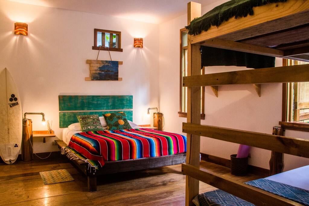 Queen bed plus bunk bed.