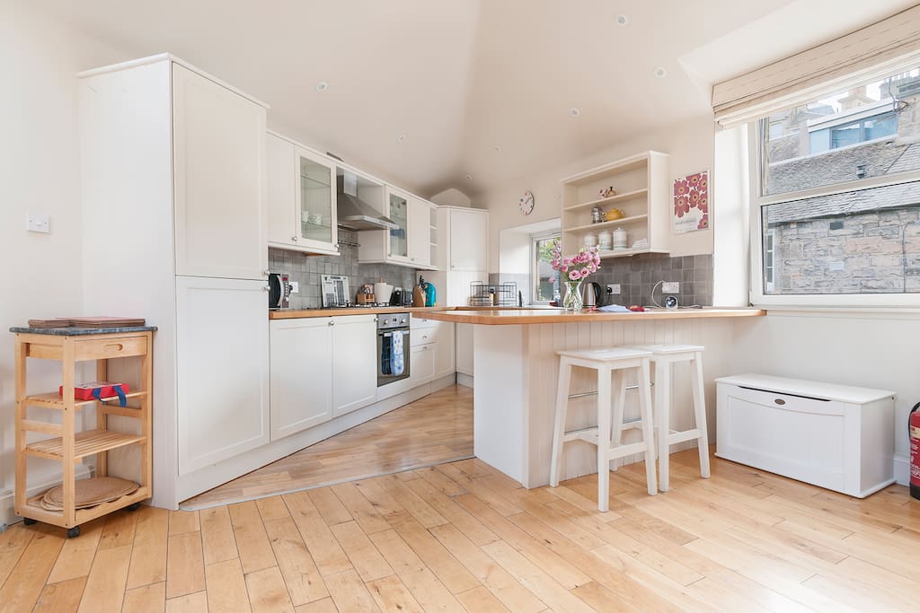 Well equipped kitchen with dishwasher, fridge freezer, fan oven, washing machine and tumble dryer
