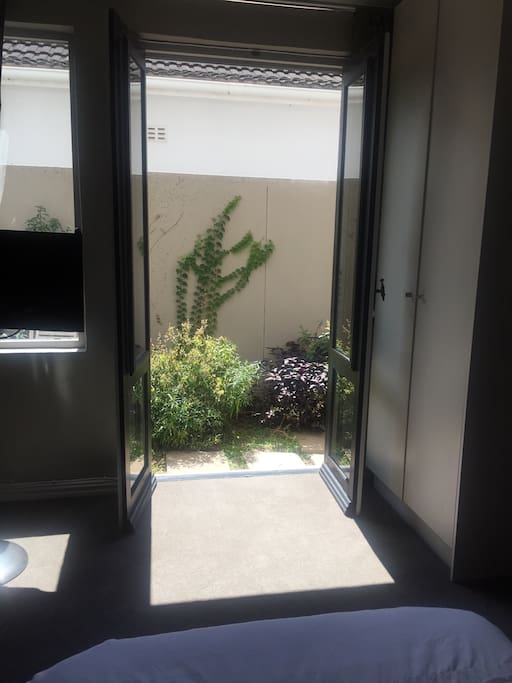 Let the sun shine in by opening the doors to a small outside space