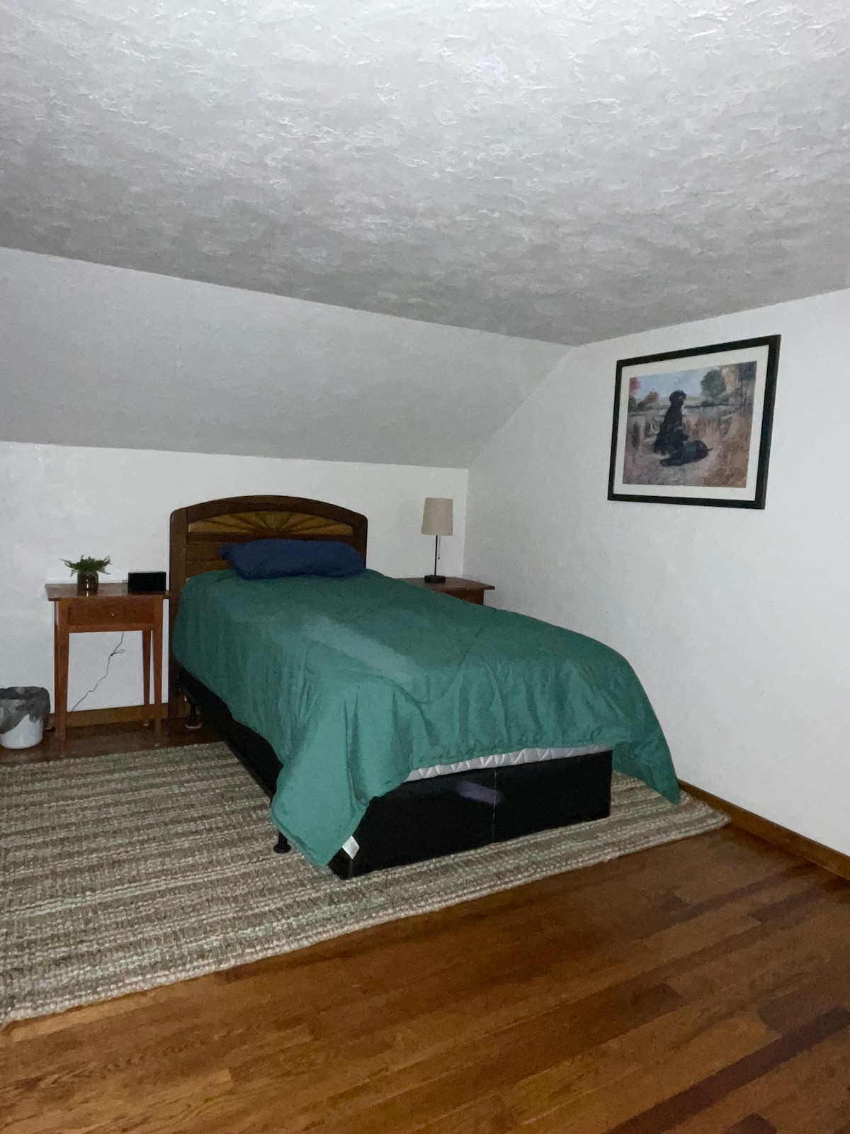 3rd bedroom upstairs with twinXL which adjoins the 4th bedroom with no door. AC window unit for summer. 
Alarm clock has USB charging port. 