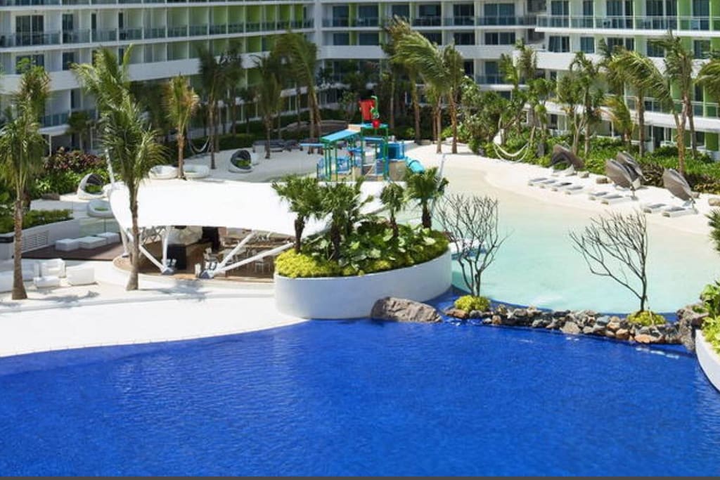 Man Made Beach and 90m wave pool - an iconic man-made beach facility with fine white sand, undulating waves and waterfalls.
