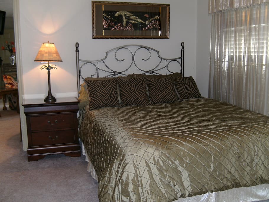 Comfy Queen size bed with bedroom balcony.