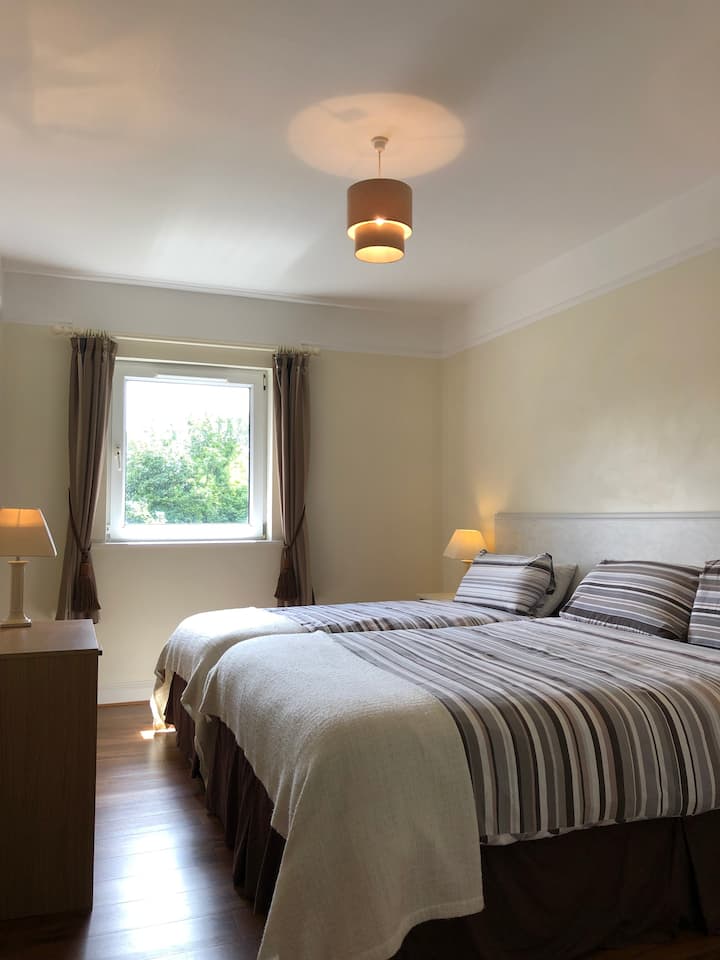 Second Bedroom has a Double Bed and a Single Bed as well as wonderful views of the River Corrib and of Galway Bay