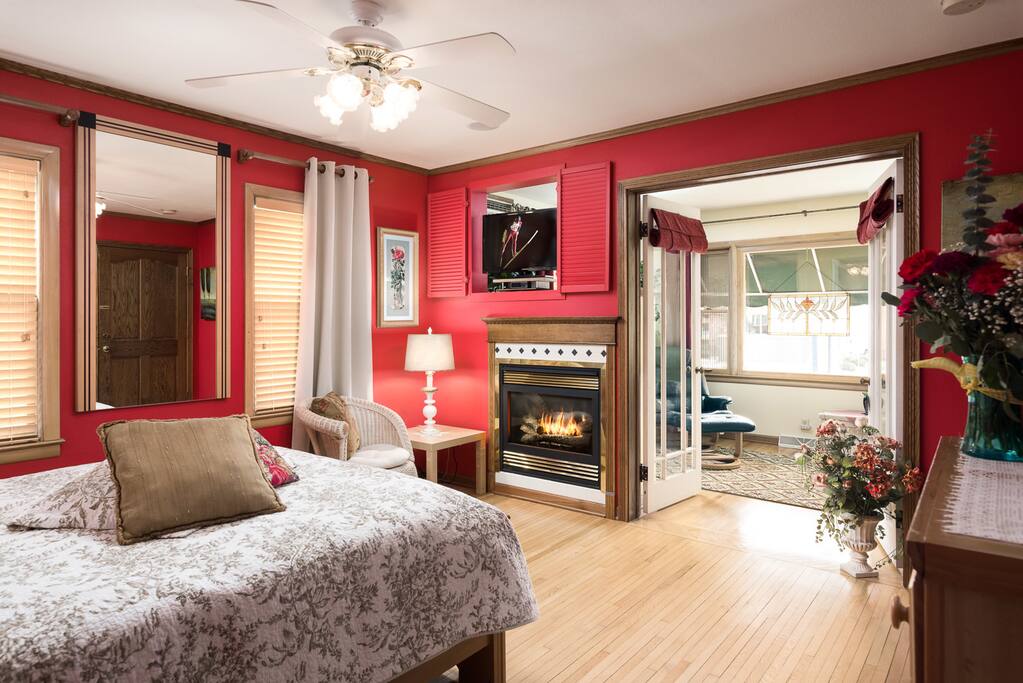 Bedroom One - queen bed, sofa sleeper, private bath. Located off the kitchen area.