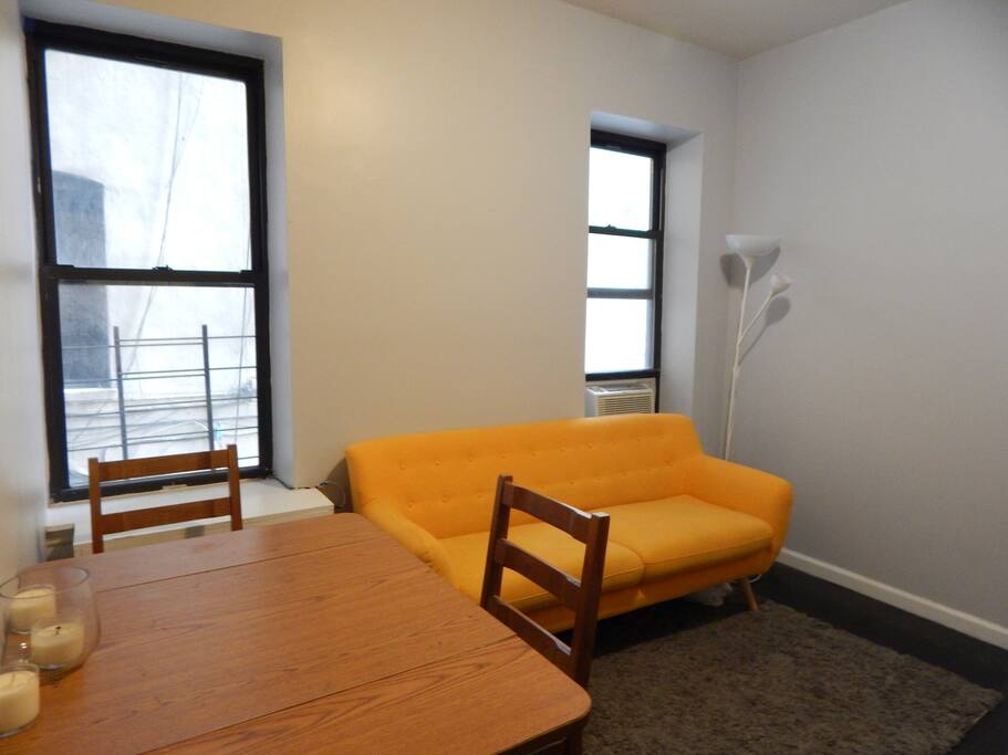 Living room with sofa and dining table