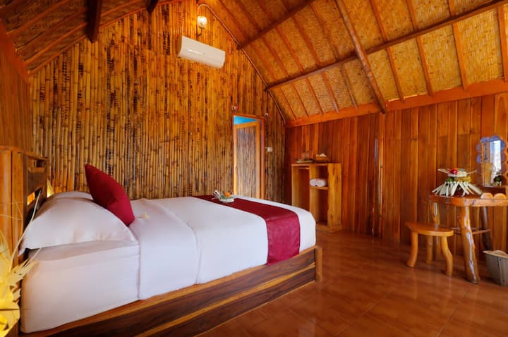 Double bed set up at The Tamban Jukung. Naturally set up from local materials of Nusa Penida highland.