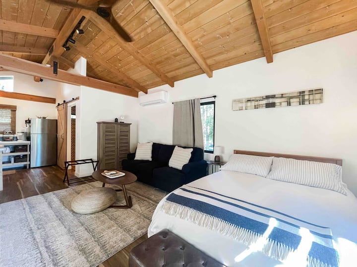 Tall wood beam ceilings, fan and very comfortable heat and cooling. 
