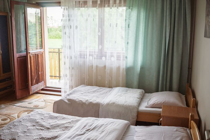 ZENIT ROOM = south room, with balcony, on 1st floor for 4 people.