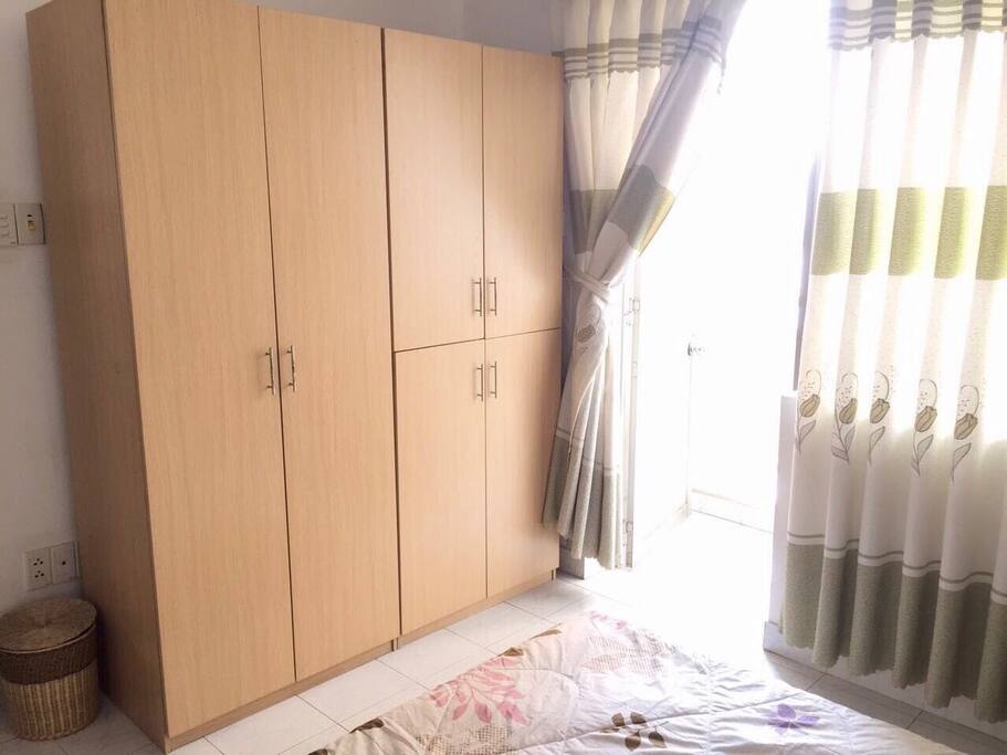 Bedroom with full height wardrobe