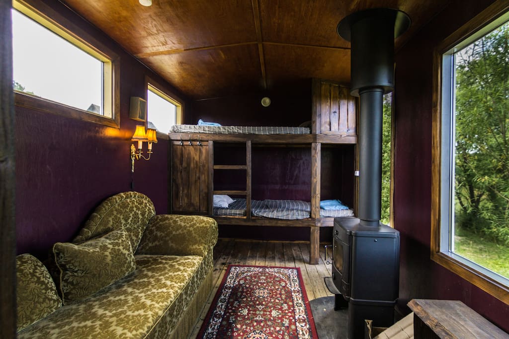 One of our dorms with single and double beds. Ocean view. Can be booked as a private room.