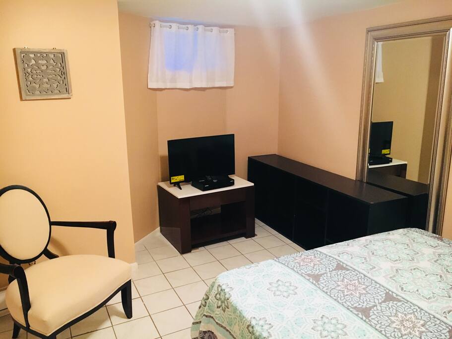 Main larger bedroom with cable TV