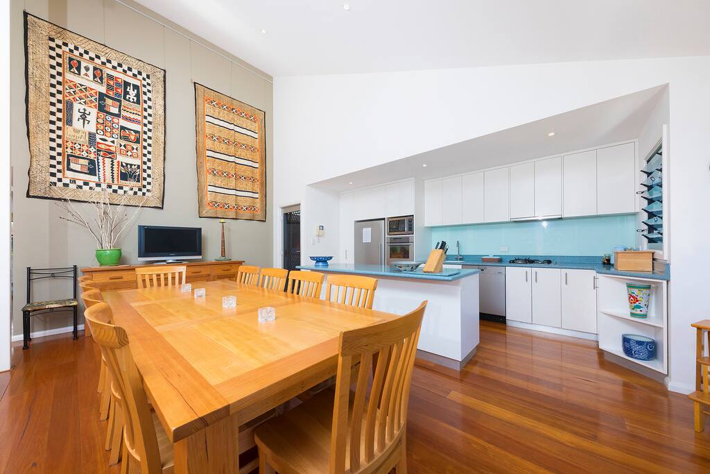 A spacious and airy dining area to enjoy meals with friends and family.