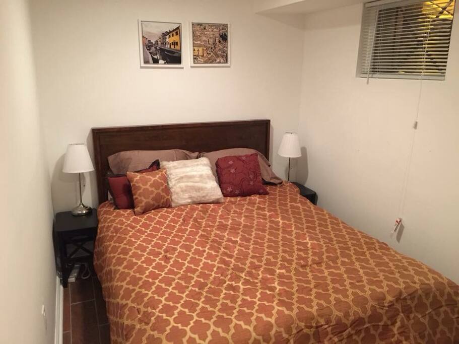 Bedroom one with a Queen sized bed